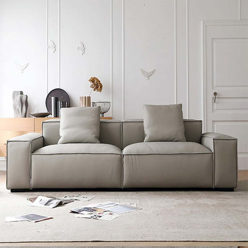 Causeuse-coussin modulable en cuir véritable gris