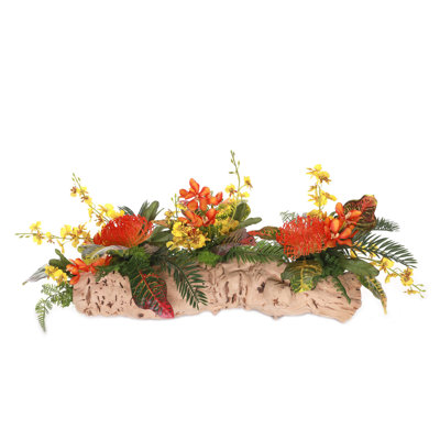Tropical Flowers Arrangement in Grapevine Log