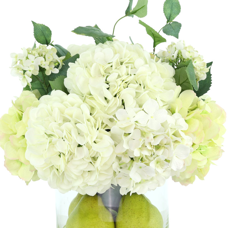 Assorted Hydrangeas, Pears And Acrylic Water In A Glass Round Vase.