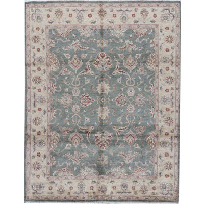 Tapis vert et doré de haute qualité noué à la main
