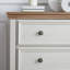 Commode 5 tiroirs beige avec armoire de rangement coulissante qui libère de l'espace