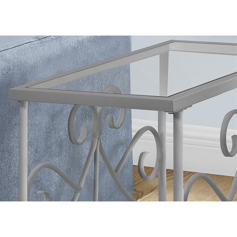 Élégante table d'appoint d'inspiration volute avec verre trempé transparent, parfaite pour le salon et la chambre à coucher