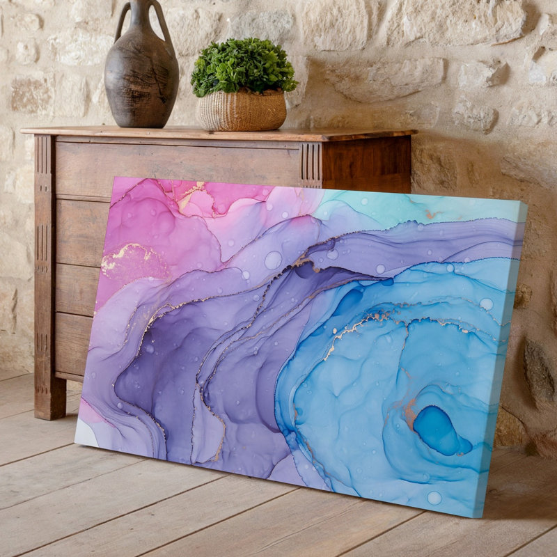 La toile crée une composition abstraite avec un mélange tourbillonnant de couleurs d'art pastel, y compris des bleus et des mauves roses