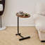 Ensemble de deux tables de bout ovales en bois et métal brun et noir