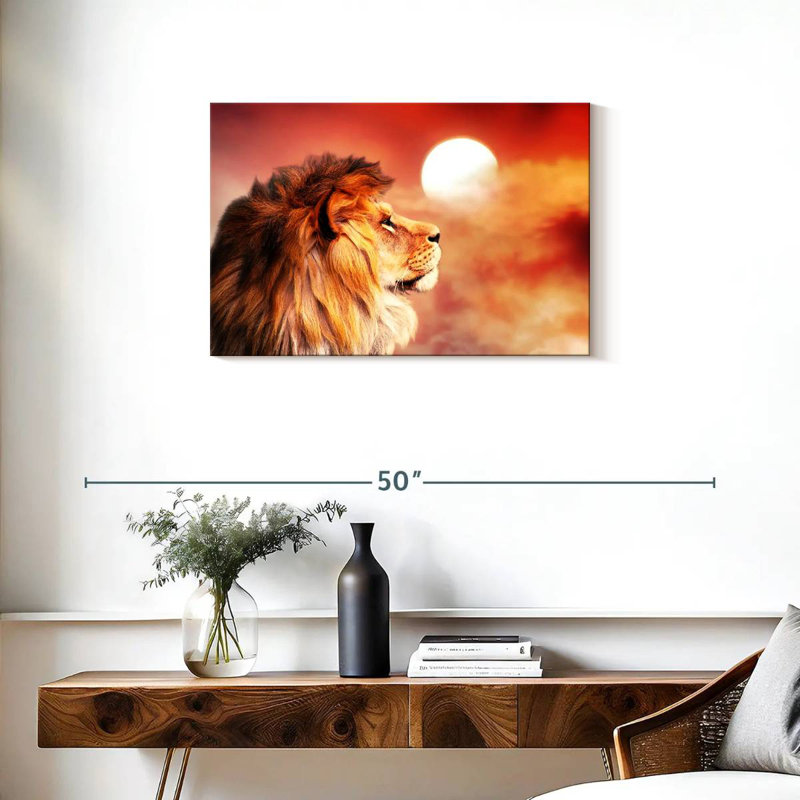 Lion surplombant un coucher de soleil, H 20 po x l 30 po
