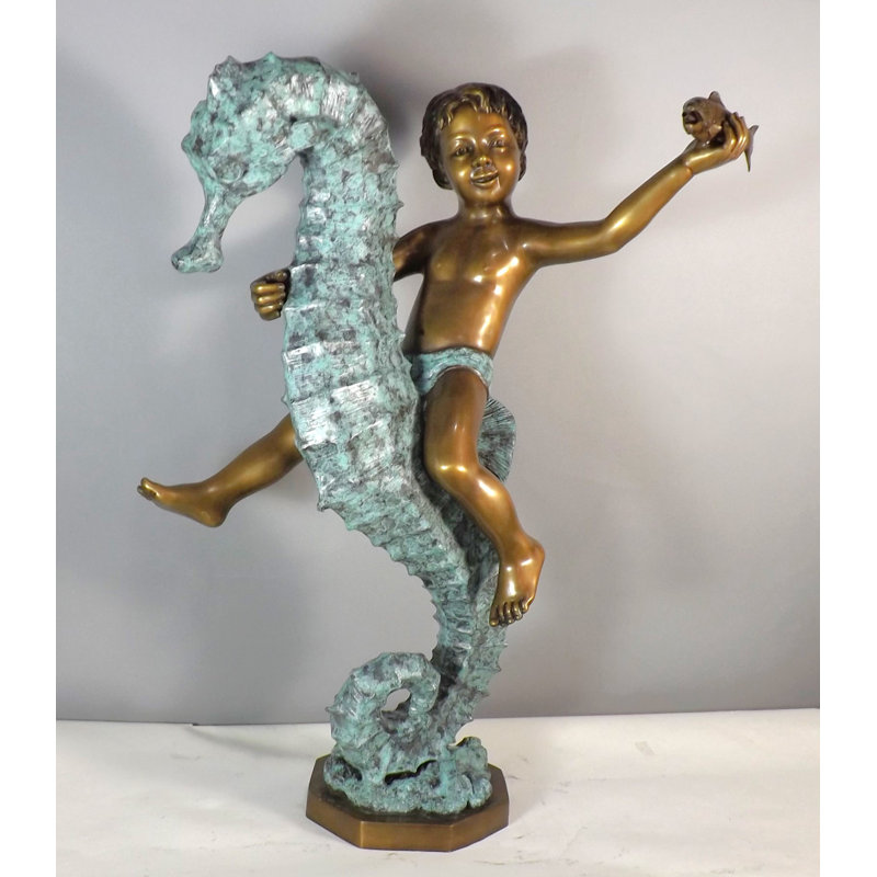 Garçon sur un hippocampe