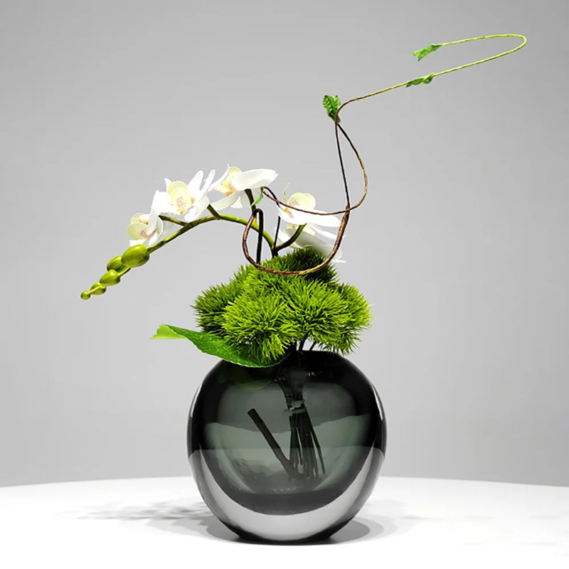 Dainara Artificial Flower Arrangement in Glass Vase, 6.7" H x 10.2" W x 17.7" D, Green
