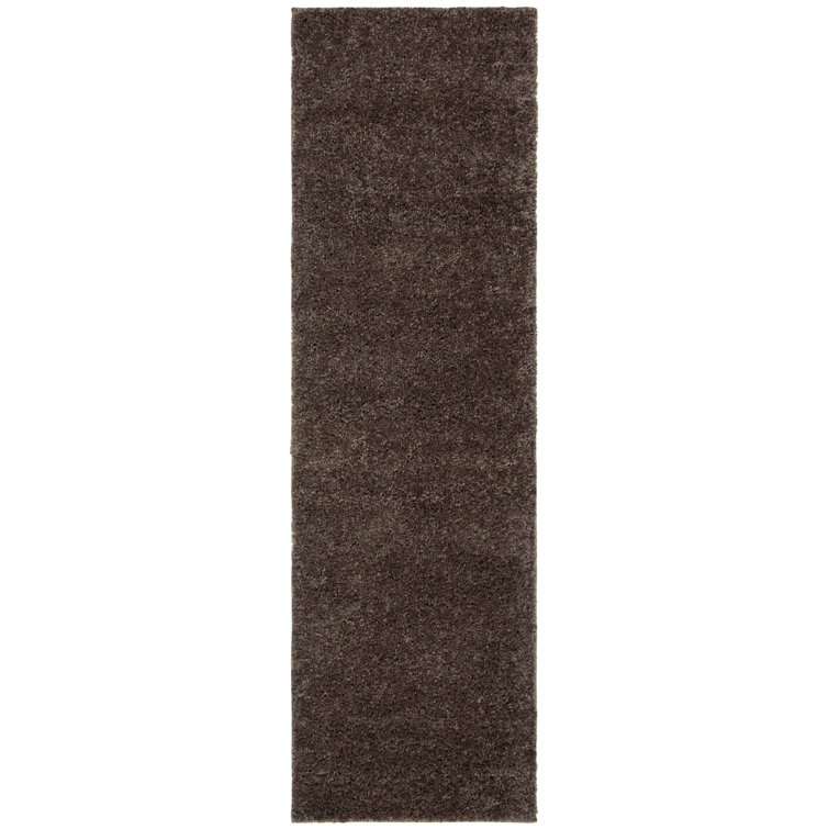 Jiang Brown Area Rug