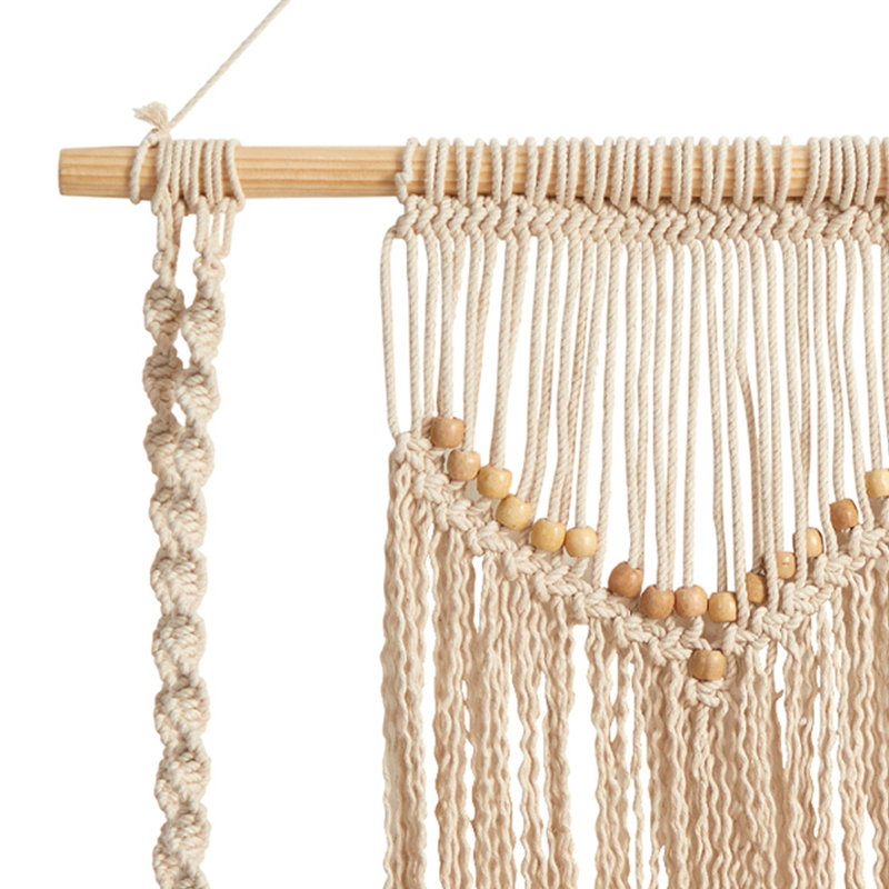 Décoration murale en bois et macramé