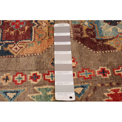 Tapis unique taupe 4 pi 1 po x 5 pi 9 po Zairo