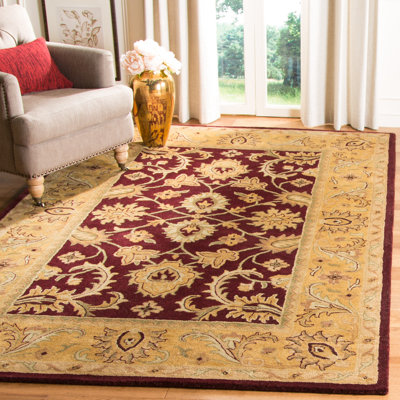 Tapis bourgogne / doré en laine touffeté à la main Bromley