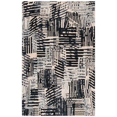 Tapis abstrait en laine / coton touffeté à la main en noir / noir Nouran Drive