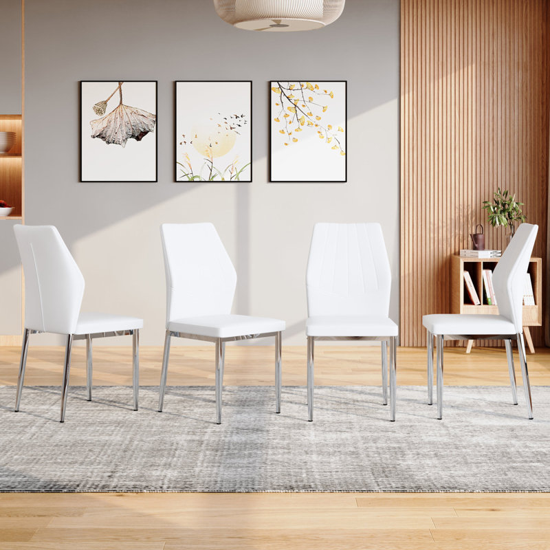 Ensemble de 4 chaises de salle à manger argentées et blanches de 37 pouces de hauteur: dossier ergonomique en polyuréthane, combinant confort et style. Mélange parfaitement confort et élégance, ajoutant plus de confort et de style à l'heure du repas.