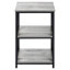 Table de chambre en stratifié gris avec support en métal noir pour un style contemporain. Construction robuste et durable. Accessoire idéal pour les petits travaux.