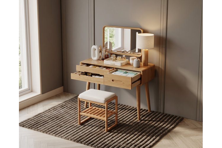 mid-century modern oak vanity with a matching stool and open drawers filled with organized makeup and skincare products.