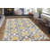 Tapis gris / jaune / crème à motif géométrique Caritta