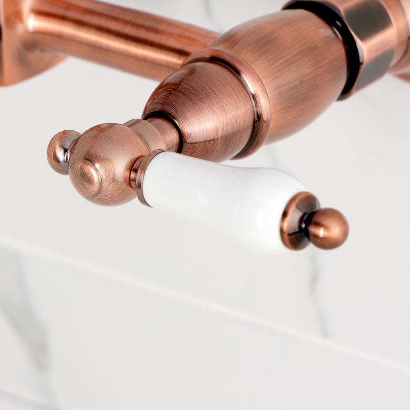 Kingston Brass Heritage Double-Handle 2-Hole Wall-Mount Bridge Kitchen Faucet, Antique Copper