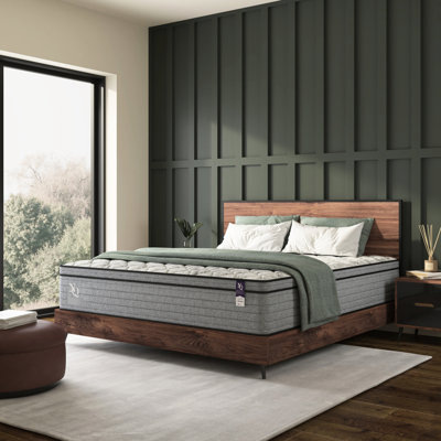Matelas de 25 cm (10 pouces) en mousse à mémoire de forme et gel rafraîchissant, compatible avec les sommiers articulés, offrant un bon maintien, une excellente absorption des mouvements et une grande résistance à l'eau. Couleur gris et blanc. Caractéristiques et avantages. Structure à ressorts.