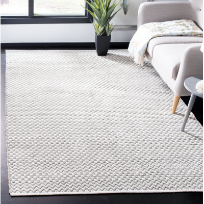 Tapis géométrique en coton tissé à plat Alpizar
