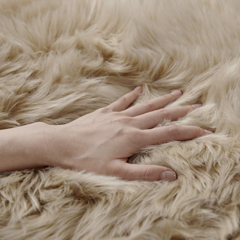 Blakes Solid Color Handmade Faux Sheepskin Area Rug in Beige, Rectangle 2' x 3'