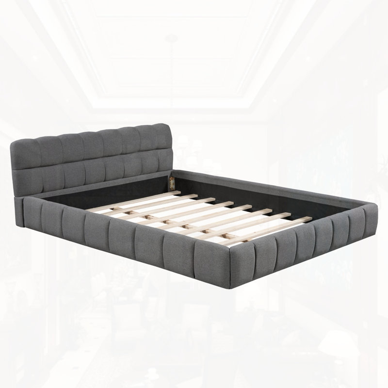 Grand lit plateforme tapissier avec tissu épais
