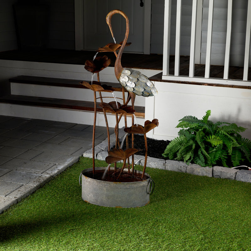Rustic Metal Crane Fountain with Leaves in Galvanized Pail