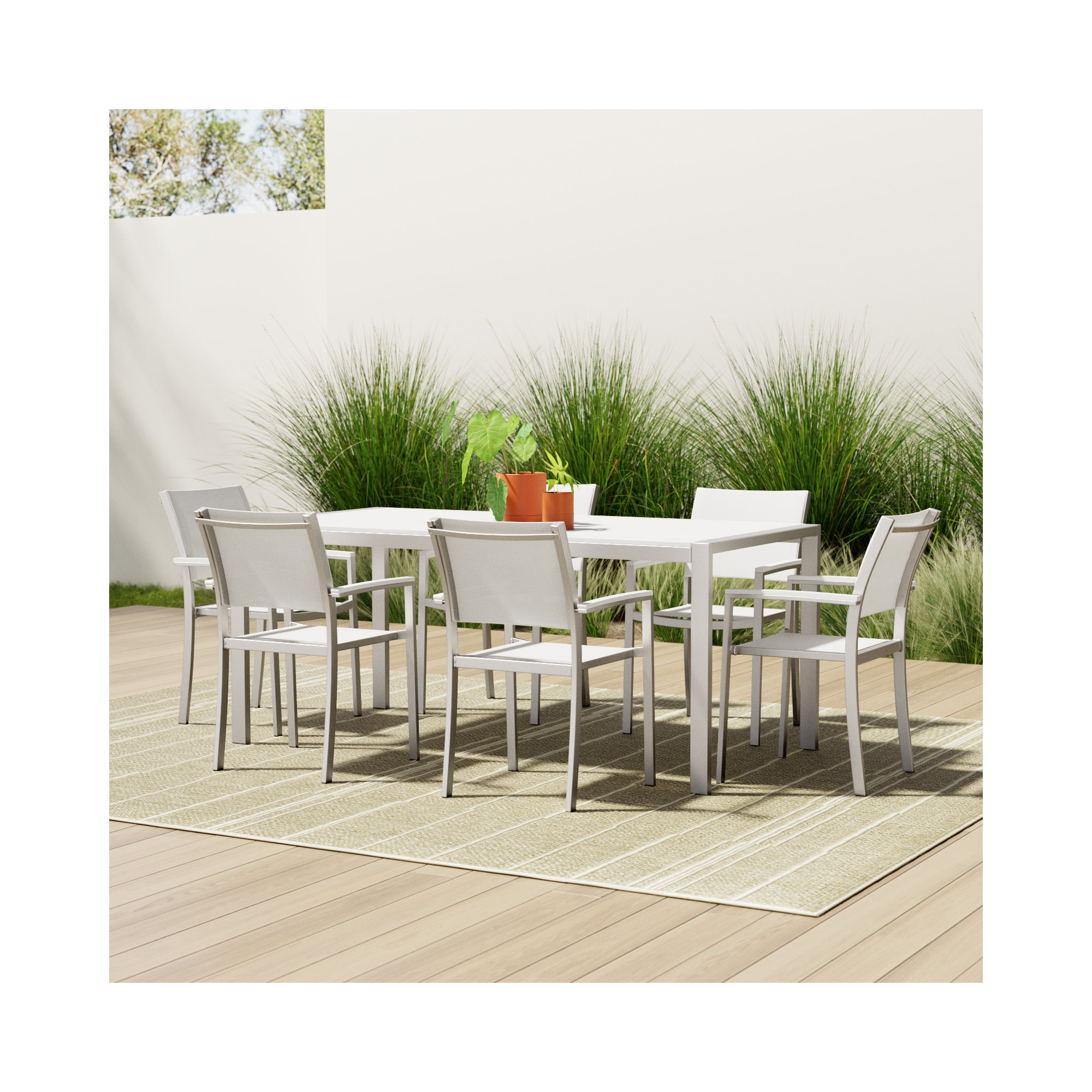 Aynura 6 - Person Metal Patio Dining Set with Rectangular Table, Silver Frame/White Top