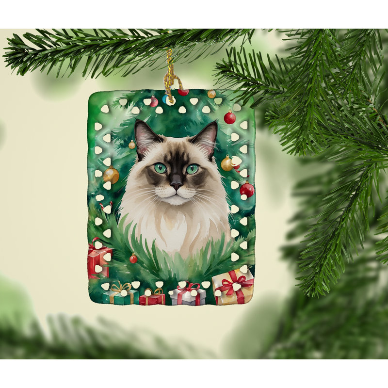Ornement en forme de chat balinais près de l'arbre de Noël, Chat balinais