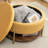 Charyn Upholstered Round Storage Ottoman-1465735374
