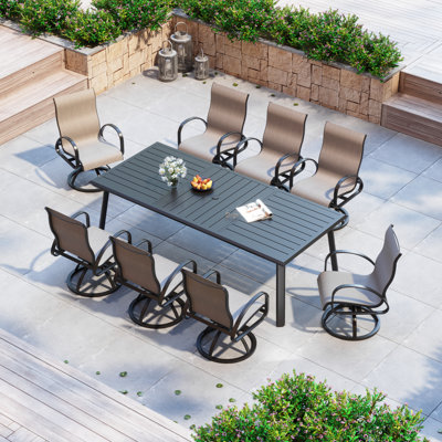 Ensemble repas pour 8 personnes avec table rectangulaire en aluminium et fauteuils pivotants en tissu Sunbrella