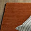 Tapis en laine rouille unie Makhari-1003433182
