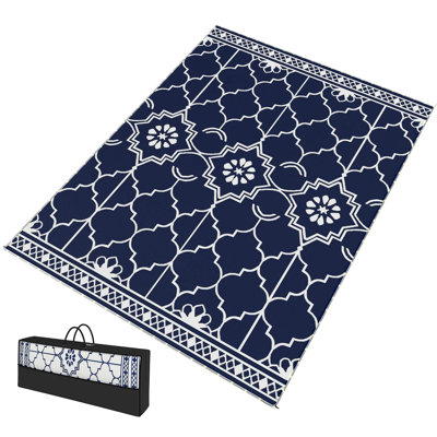 Tapis d'extérieur réversible bleu foncé et blanc avec lumières à DEL, conception pliable avec sac de transport et piquets de sol pour le patio