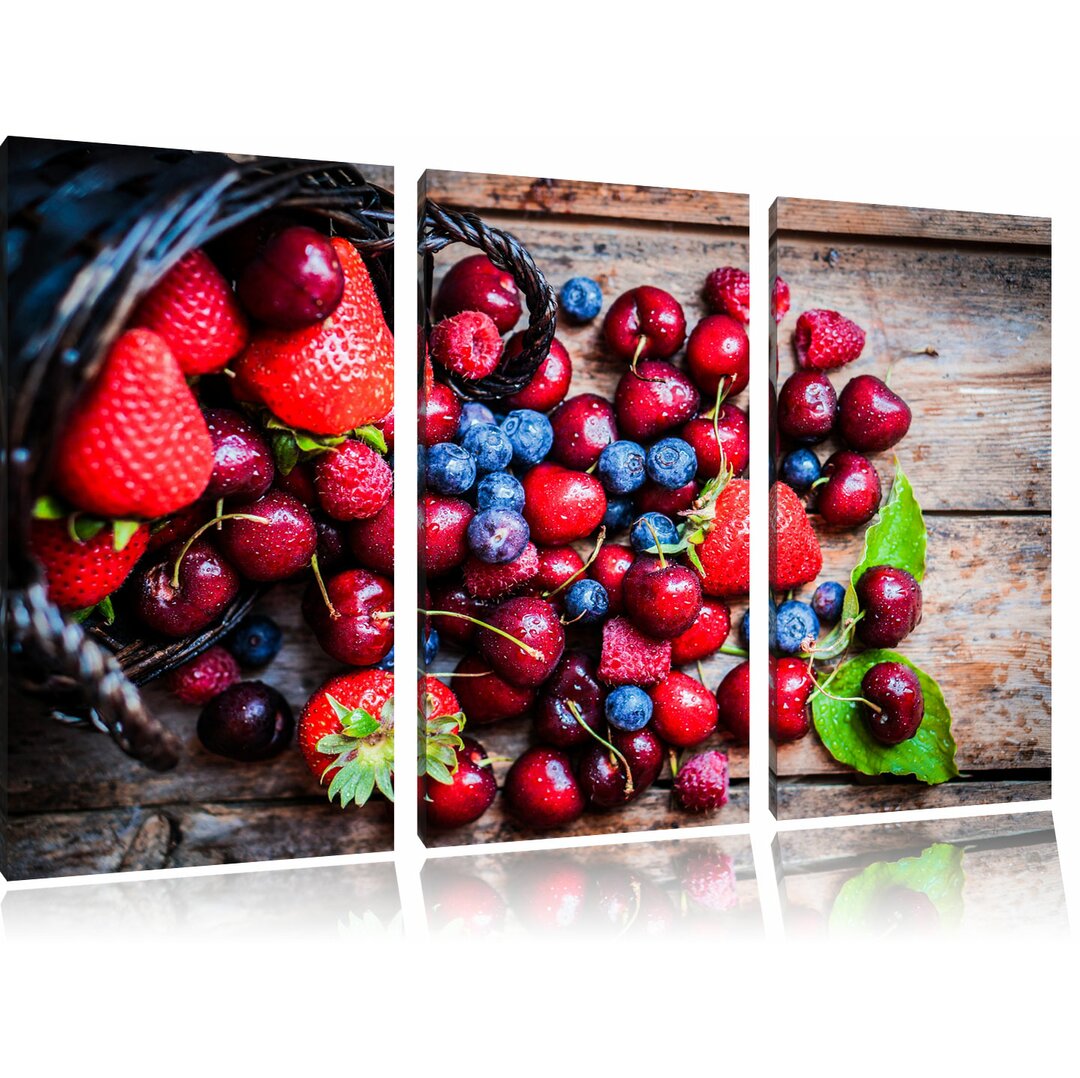 3-tlg. Leinwandbilder-Set „Rote Beerenfrüchte auf edlen Holzdielen“, Fotodruck