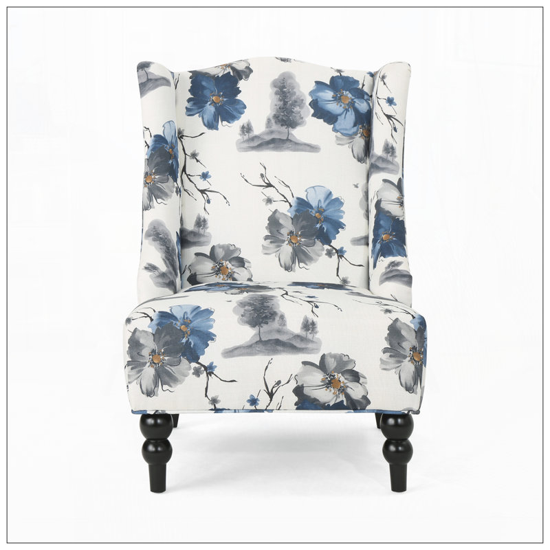 Fauteuil club en tissu à haut dossier