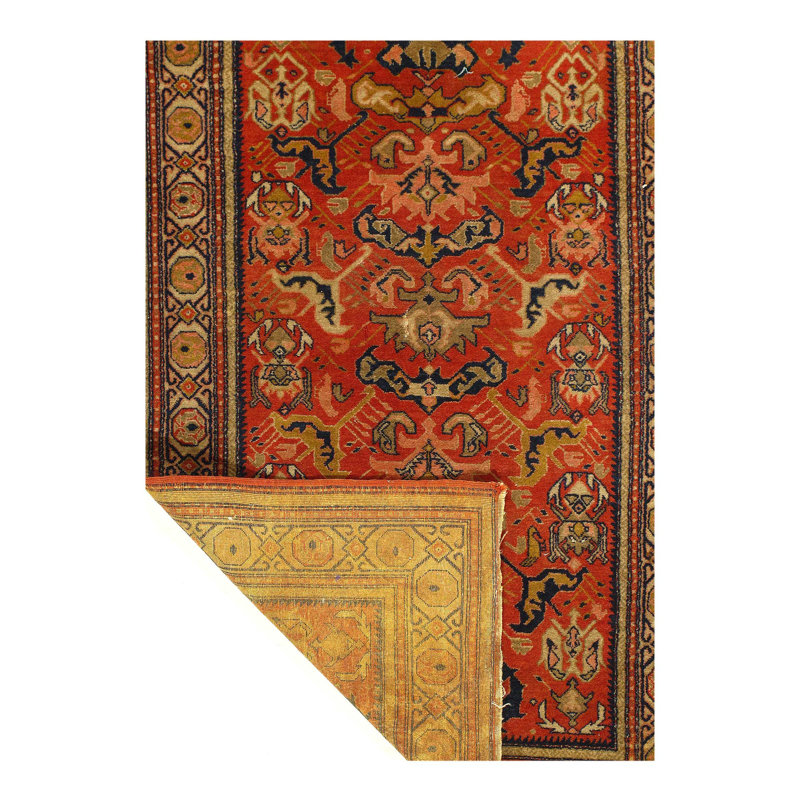 Melaku Oriental Area Rug in Rust
