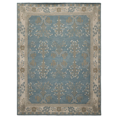 Tapis oriental multicolore en laine touffeté à la main