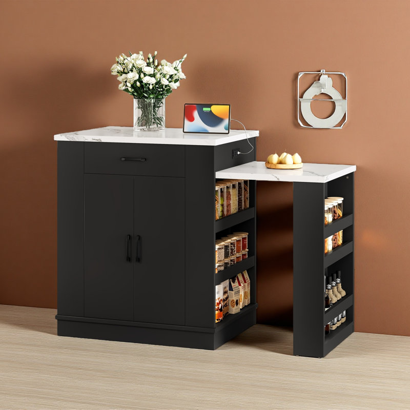 Console d'îlot extensible avec tiroirs, armoire à deux portes et tablettes ouvertes. Sert de table de salle à manger, barre de petit déjeuner temporaire
