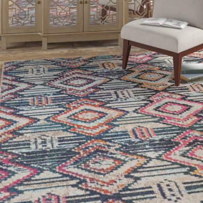 Felty Southwestern Orange/Pink/Blue Area Rug
