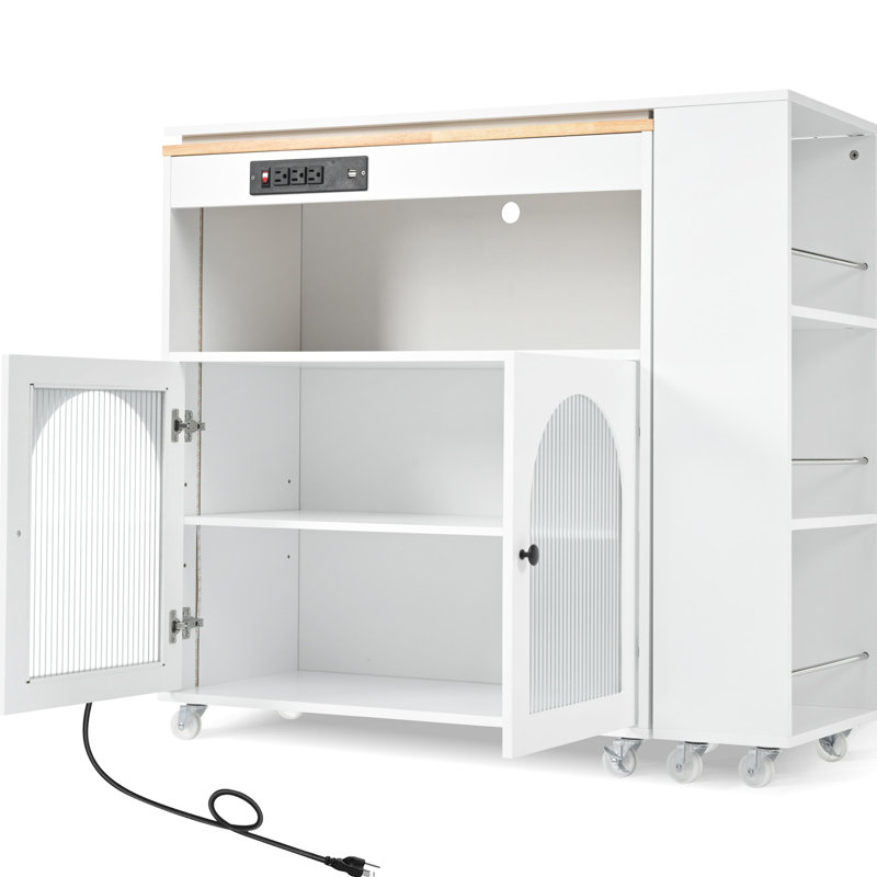 Grand îlot de cuisine avec éclairage DEL, prises électriques, blanc, table coulissante réglable et spacieuse, 2 portes vitrées cannelées, rangement