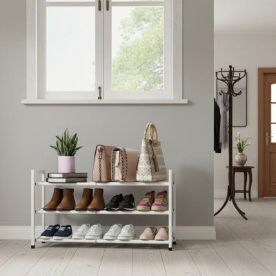Three-Tier Telescopic Metal Shoe Rack, White, 18-33 Inch Adjustable, Sturdy Shoe Storage Rack For Wardrobes And Entryways.