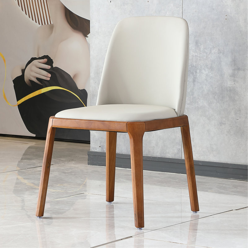 2 chaises de salle à manger grises au look moderne avec cuir PU, pieds en bois et coussin de velours particulier