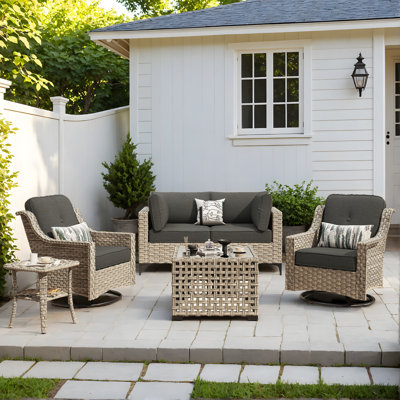 Demariea Outdoor Wicker 4 Person Seating Group With Cushions With Swivel Rocking Chairs by Lark Manor