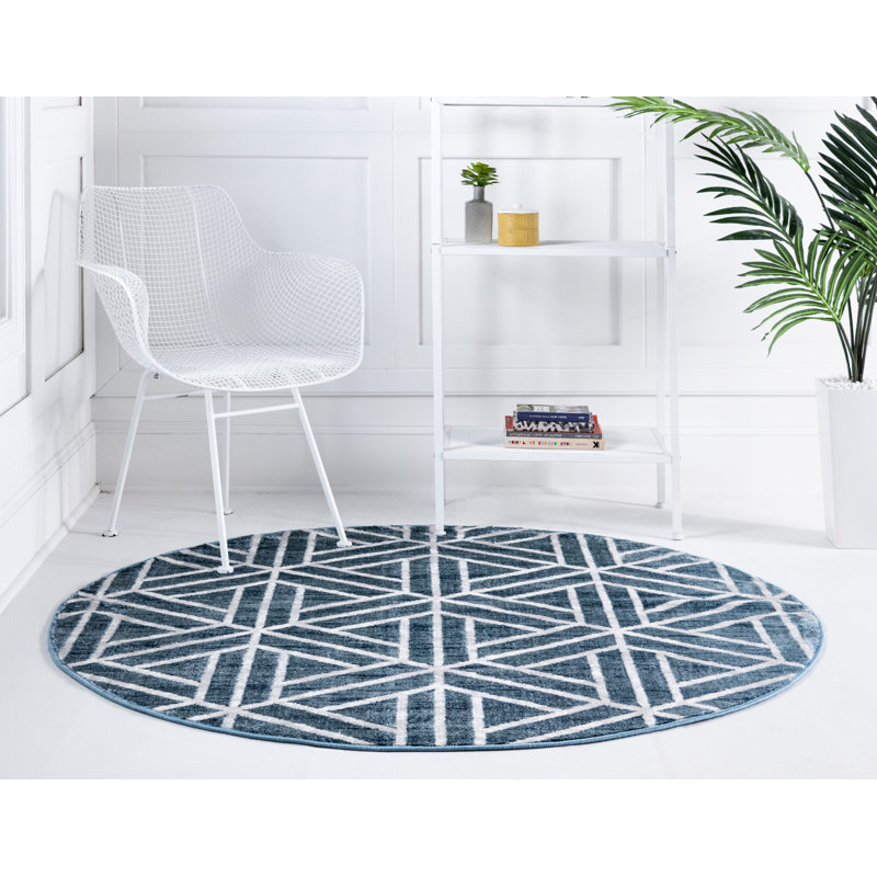 Tapis géométrique en laine bleu / ivoire Nucla, Rond 8 pi