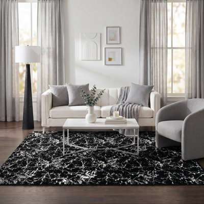 Tapis noir à motif abstrait Juiliana