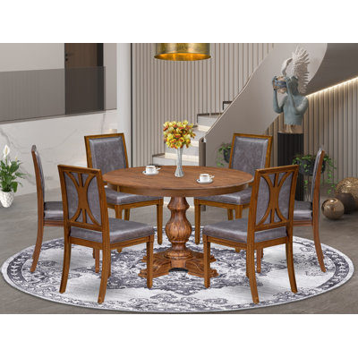 L'ensemble de table à manger 7 pièces se compose d'une table de cuisine ronde et de 6 chaises en similicuir gris foncé avec dossier haut et finition noyer antique.