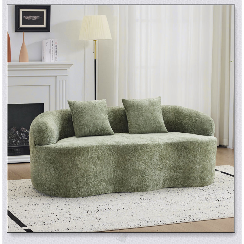 Canapé courbé vert avec accoudoirs ronds, canapé à compression avec 2 coussins, crème pour petits espaces et installation facile