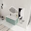 Meuble-lavabo flottant avec lavabo en résine en forme de goutte