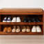 Banc de rangement escamotable en cuir massif-386777368