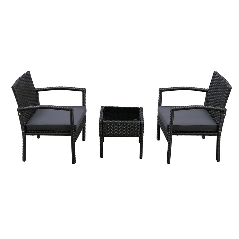 Ensemble de conversation en rotin de trois articles avec coussins