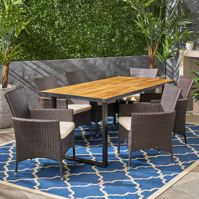 Wadsworth 6 - Person Acacia Solid Wood Patio Dining Set Rectangular Table with Cushions Included